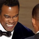 Image of Chris Rock “upscaled” with AI on the iPhone app Remini.